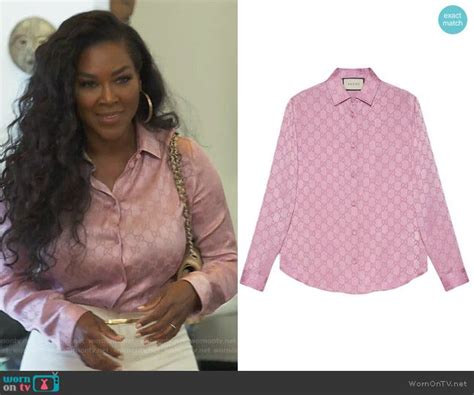 Kenya’s pink Gucci monochrome print blouse on The 